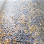 The cured Asbestos encapsulating primer